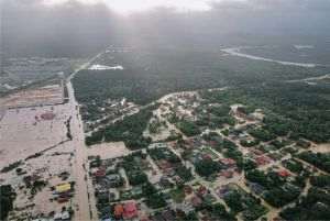 China hit by devastating floods; California faces large-scale vegetation fires